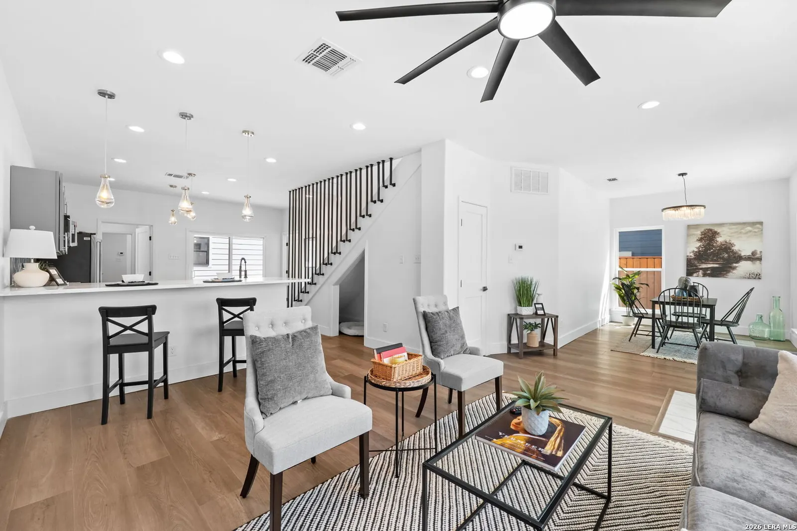 Open-concept living room staged by Vabulous Living Staging Co.